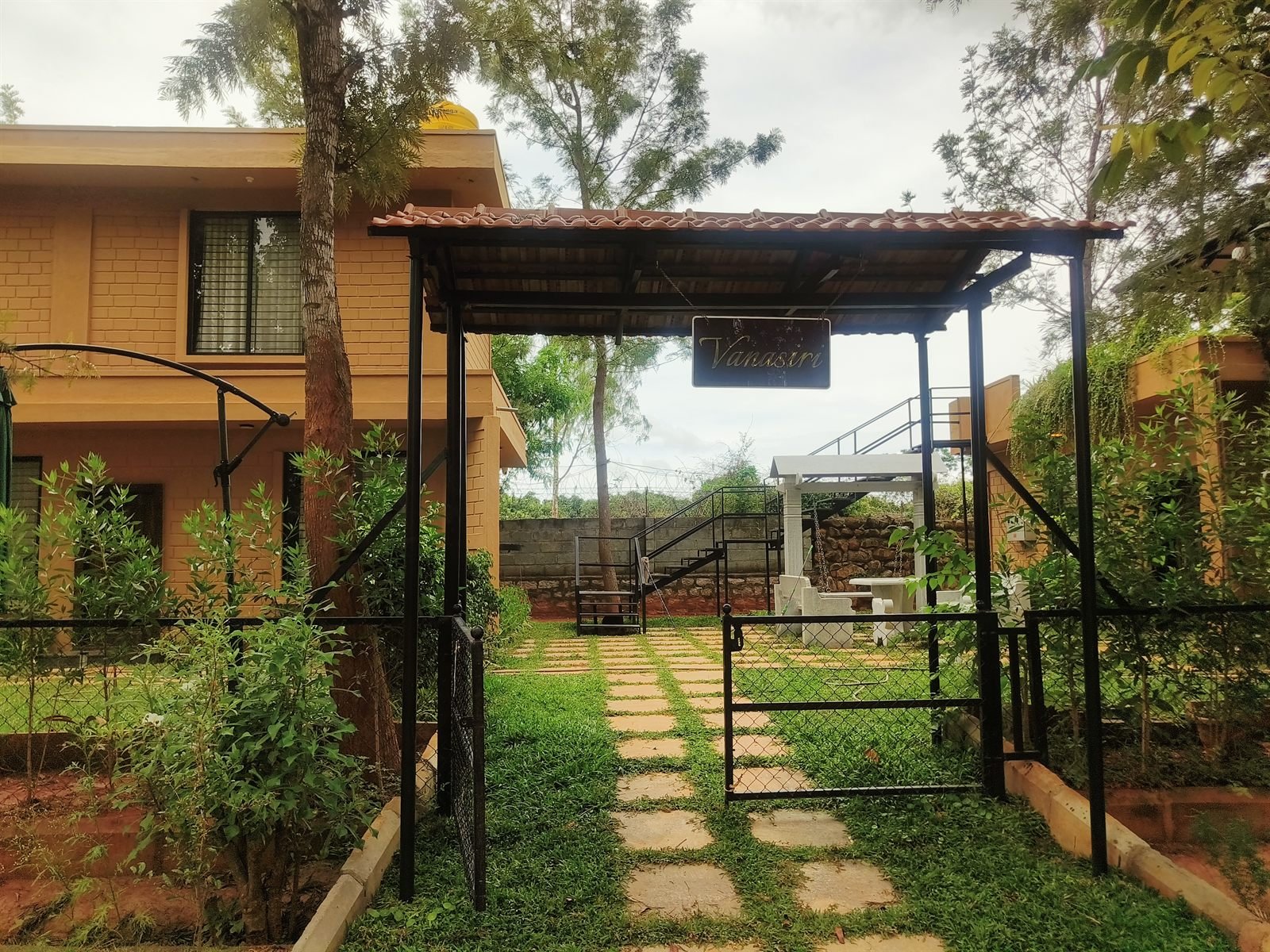 Terracotta roof entry with natural timber details